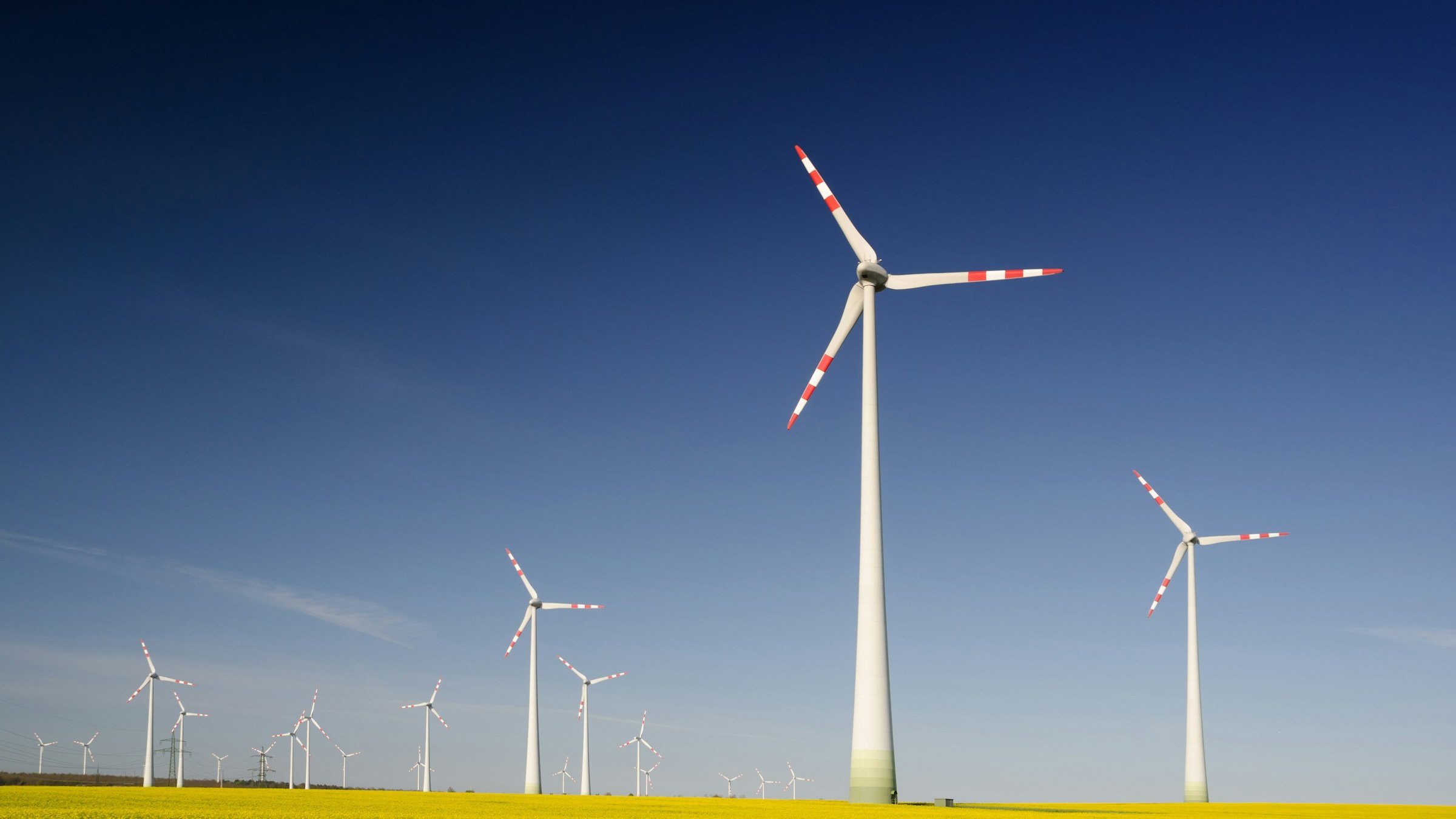 Wind turbines on a green field